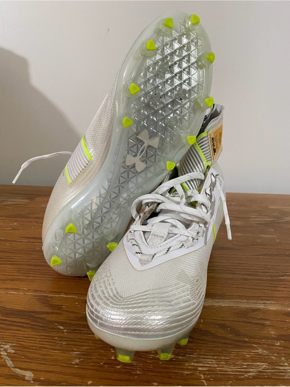 Under Armour men's White Cleats with Neon Yellow Highlights